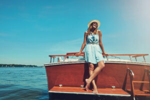Shot of an attractive young woman spending the day on her boat