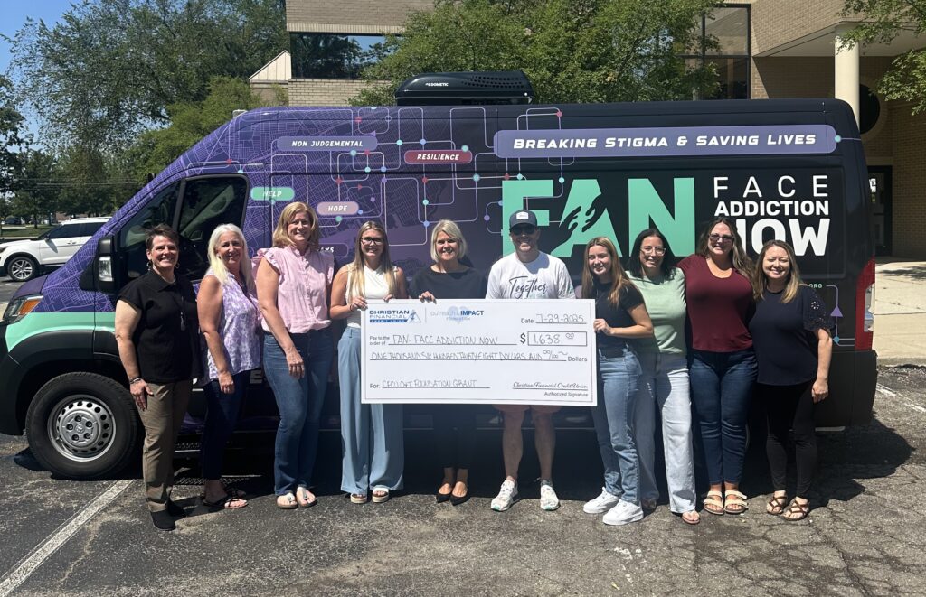 Check presentation in front of van