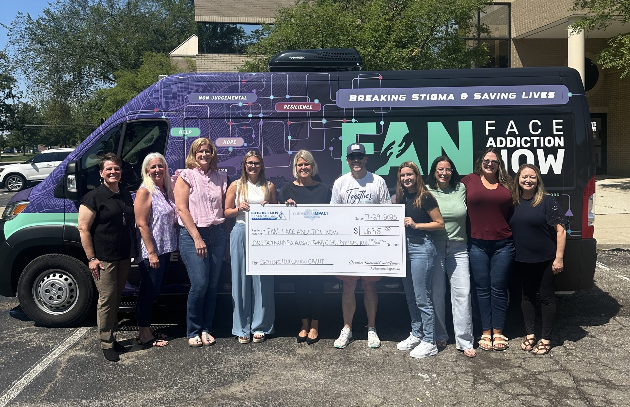 Check presentation in front of van